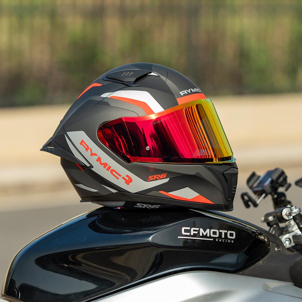 sr6 red black full face helmet on a sport bike.