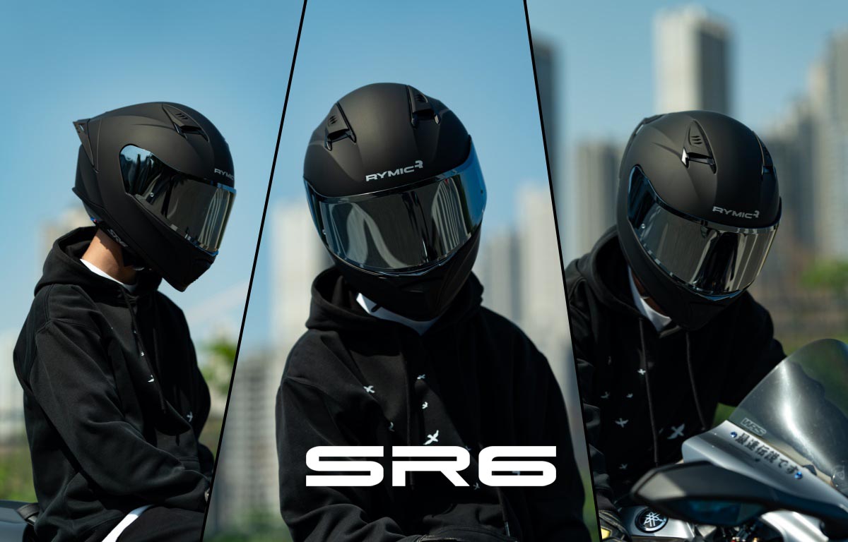 A rider wearing the RYMIC sr6 matte black full face helmet, showcasing its sleek aerodynamic profile.