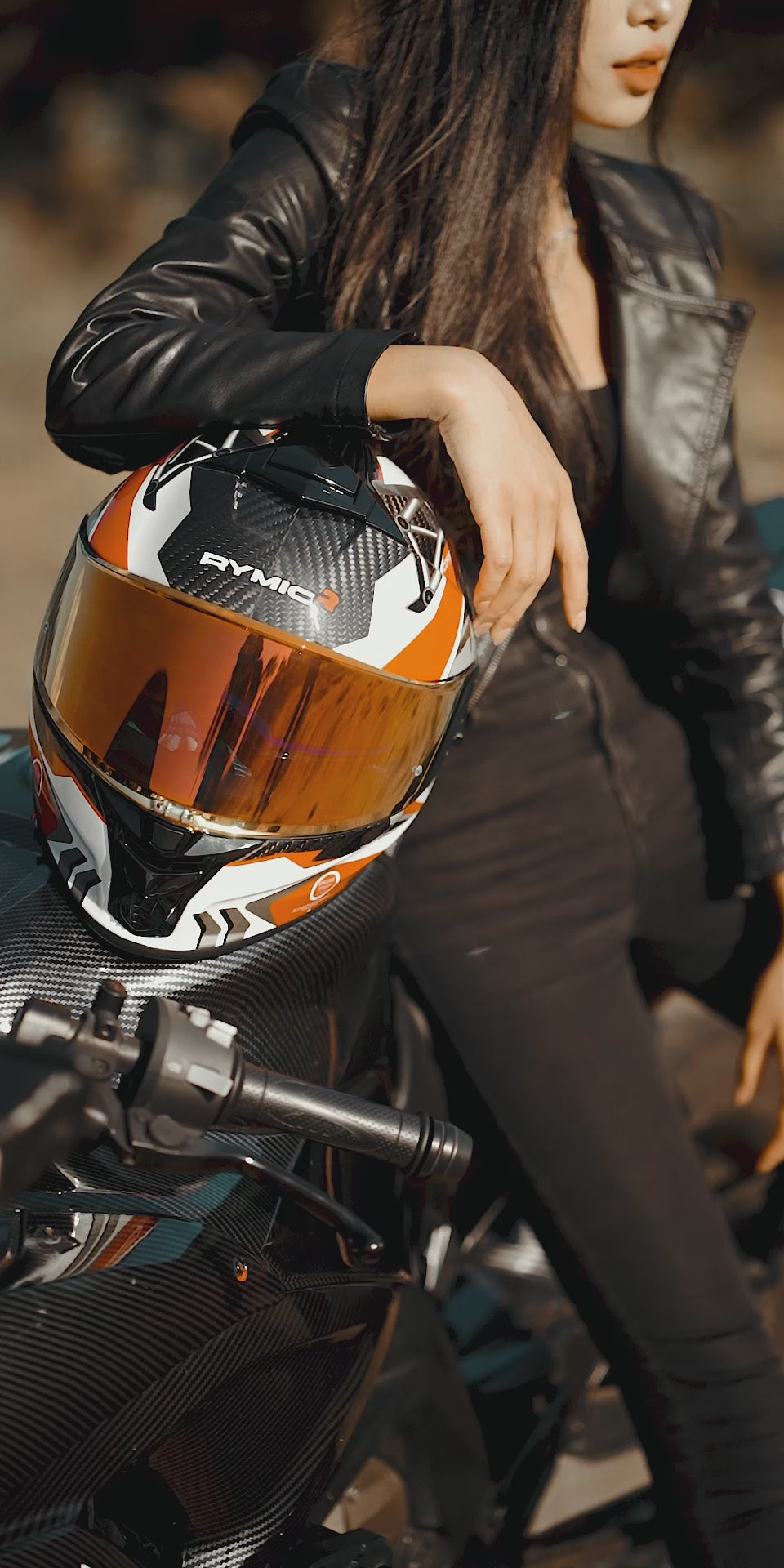 Load video: Video overview of the RYMIC S-GT red &amp; black carbon fiber helmet.