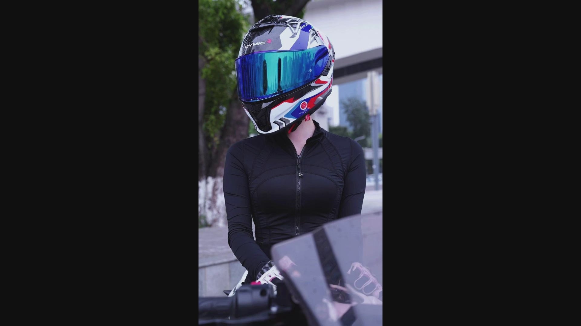 Load video: Video overview of the RYMIC S-GT red &amp; black carbon fiber helmet.