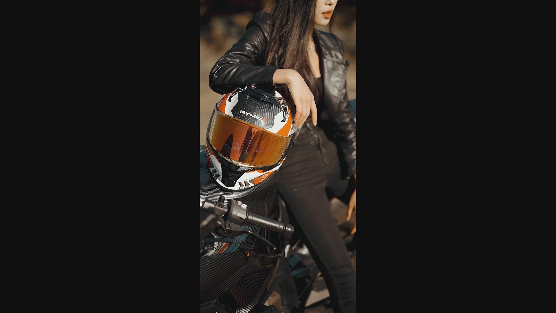 Load video: Video overview of the RYMIC S-GT red &amp; black carbon fiber helmet.