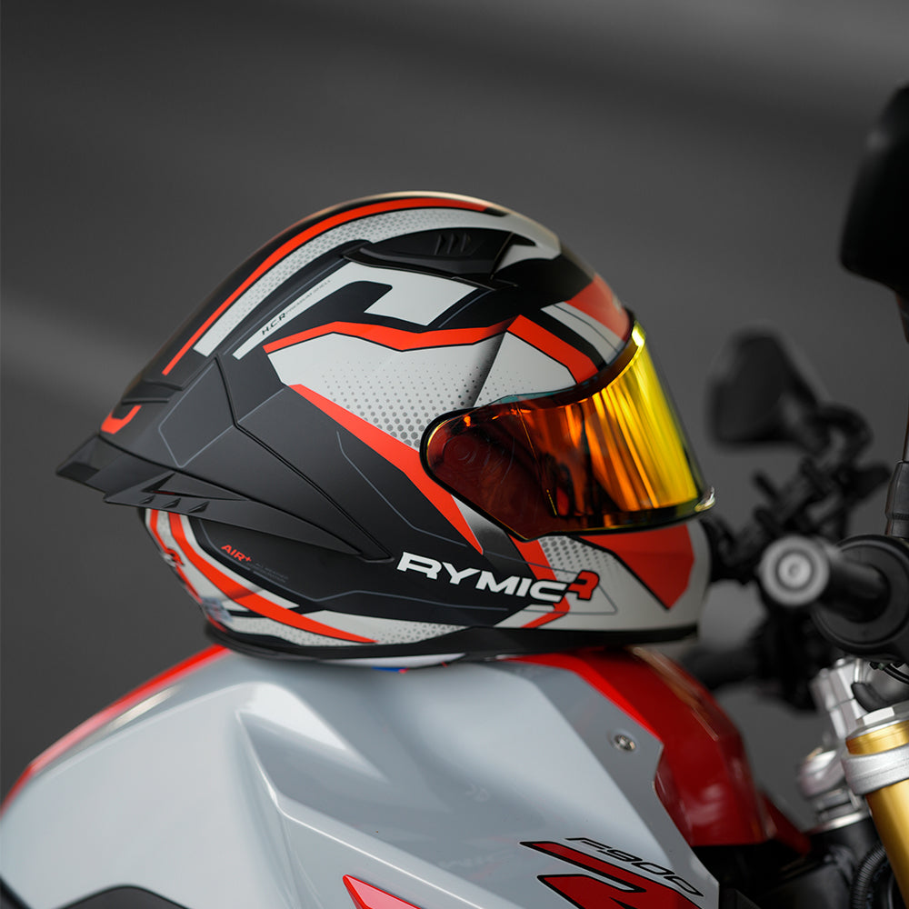 sr6 red gray full face helmet on a sport bike.