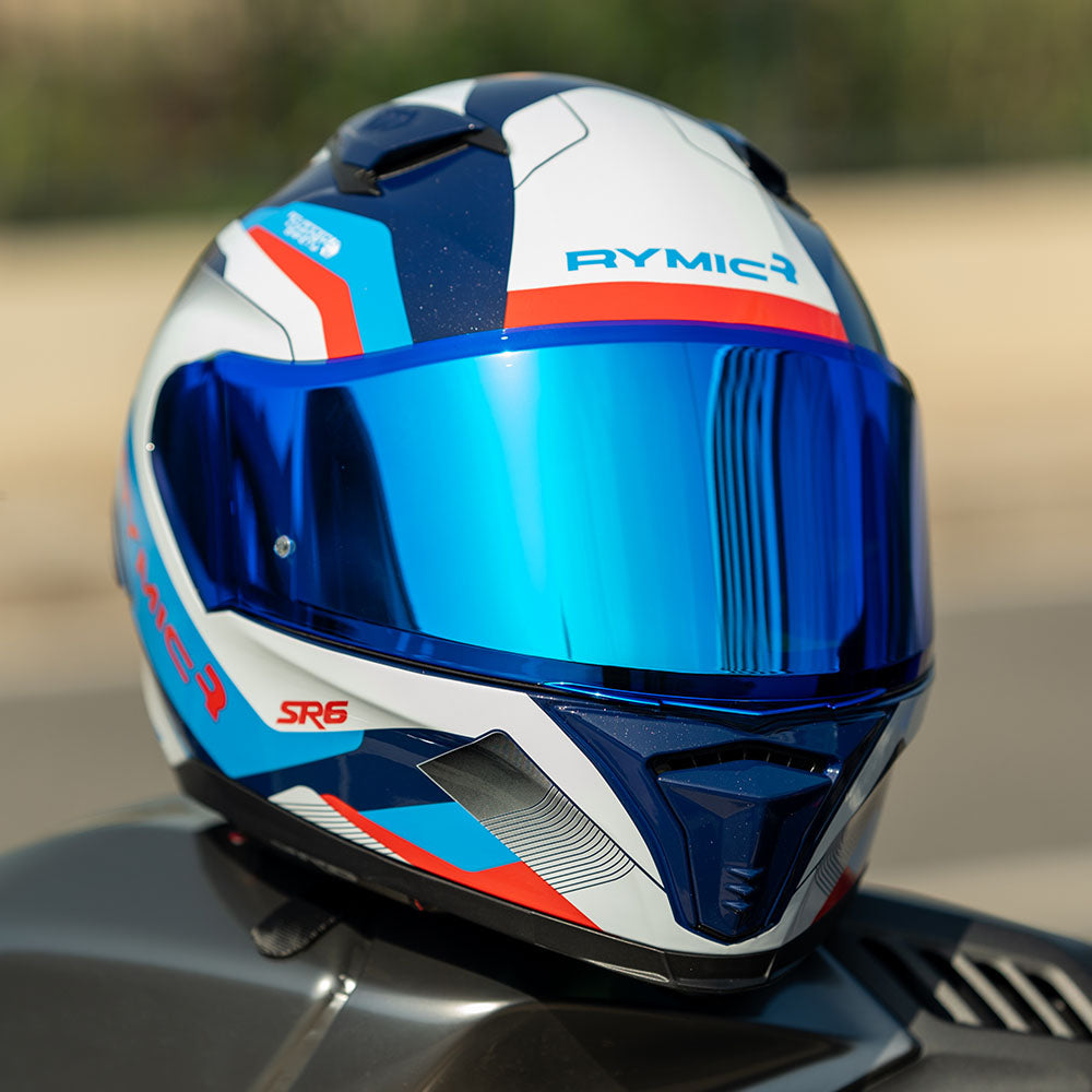 sr6 white blue full face helmet on a sport bike.